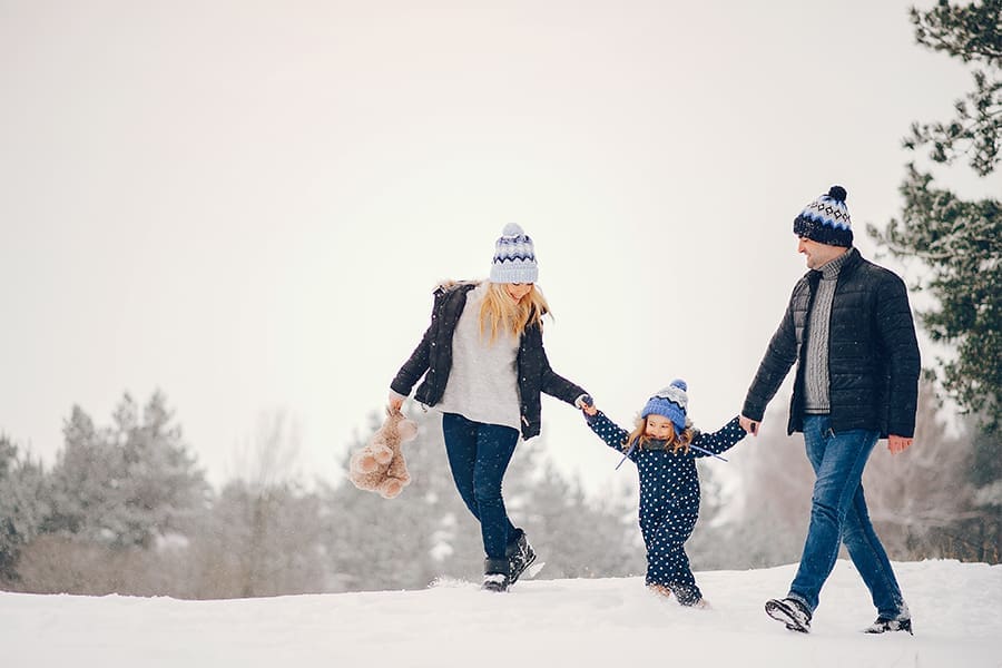New London, NH - Family Enjoying the Outdoors After Snowfall in Winter