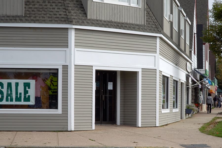Commercial Property Insurance - Retail Clothing Storefront on a Main Street in Small Town